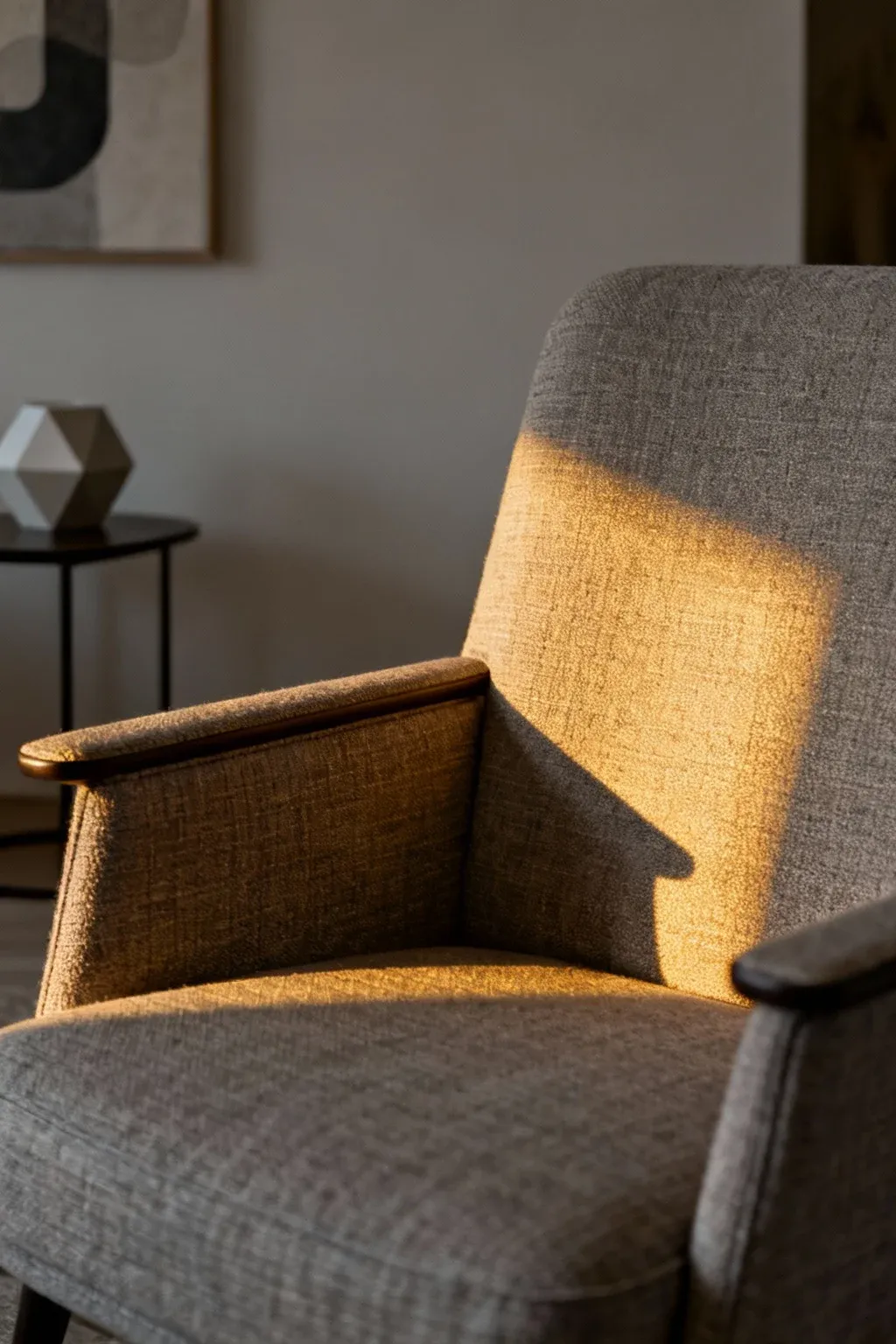 Deep-seated armchair with narrow arms designed for comfort