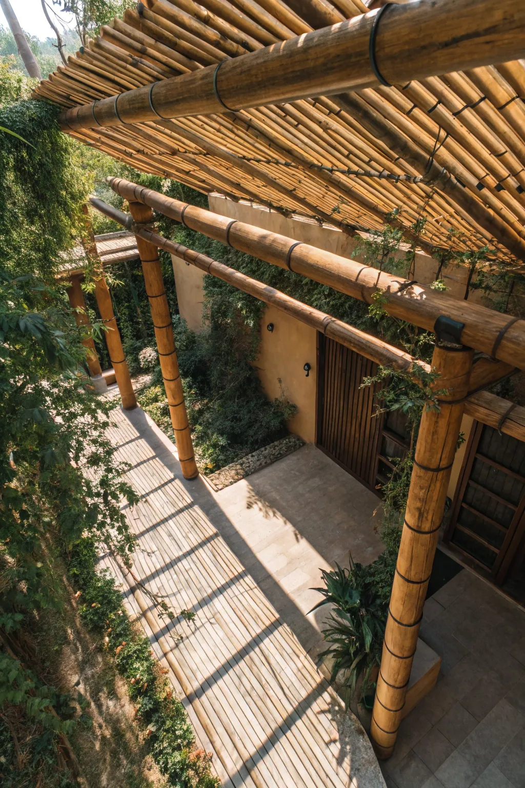 A beautiful bamboo pergola adorned with climbing plants, creating a charming entryway.