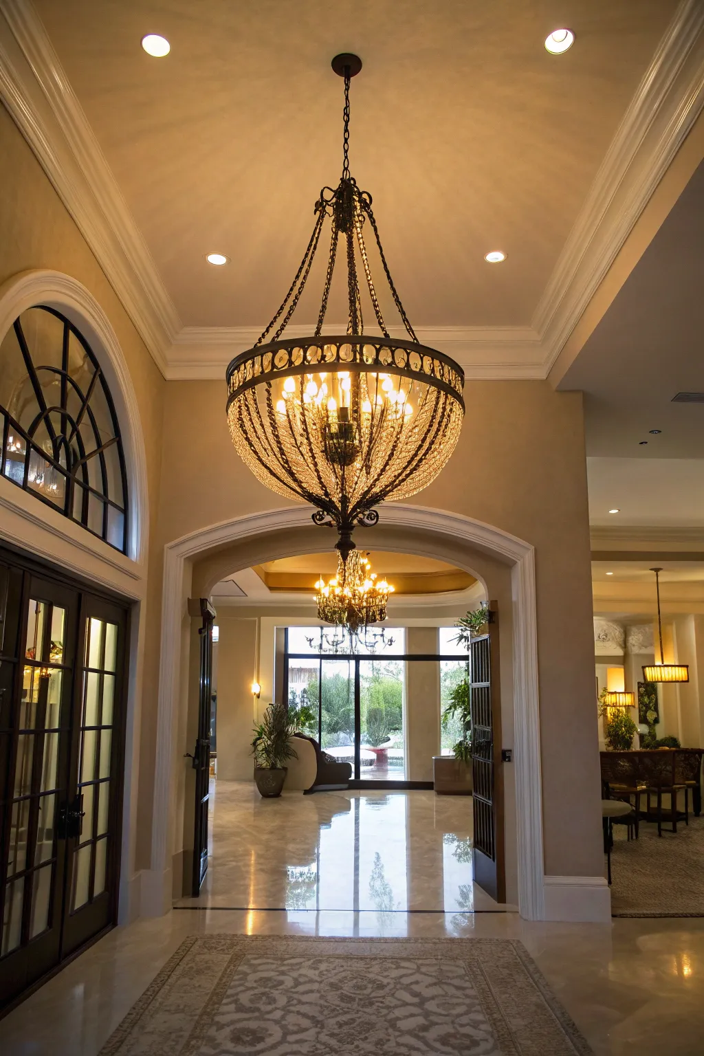 A unique chandelier illuminating a stylish entryway.