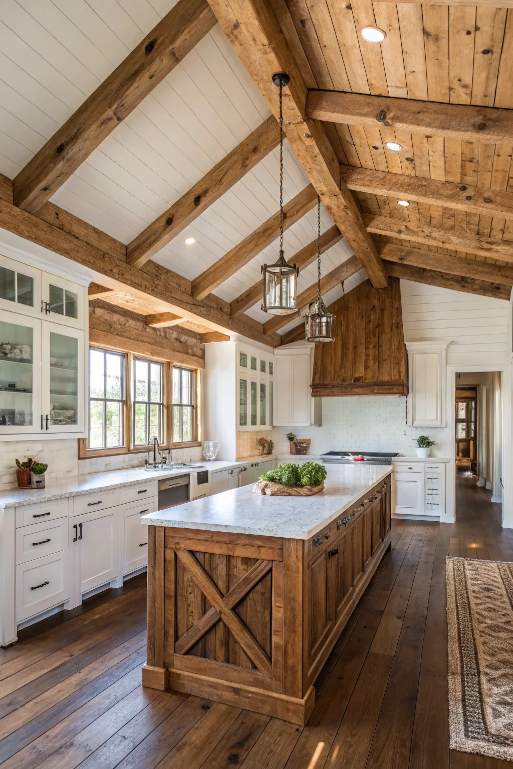 A coastal farmhouse kitchen featuring rustic wooden beams, white shiplap walls, and natural decor.
