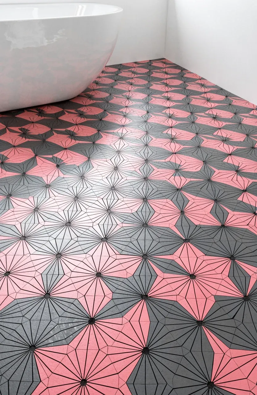 Modern bathroom with pink and grey geometric hexagonal floor tiles and white walls.