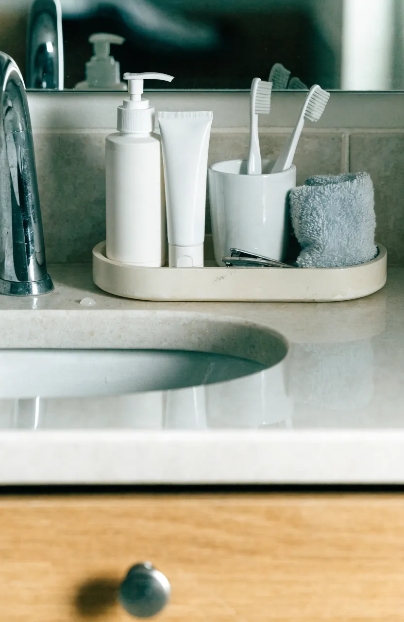 Bathroom vanity tray with only everyday items and clear counter space