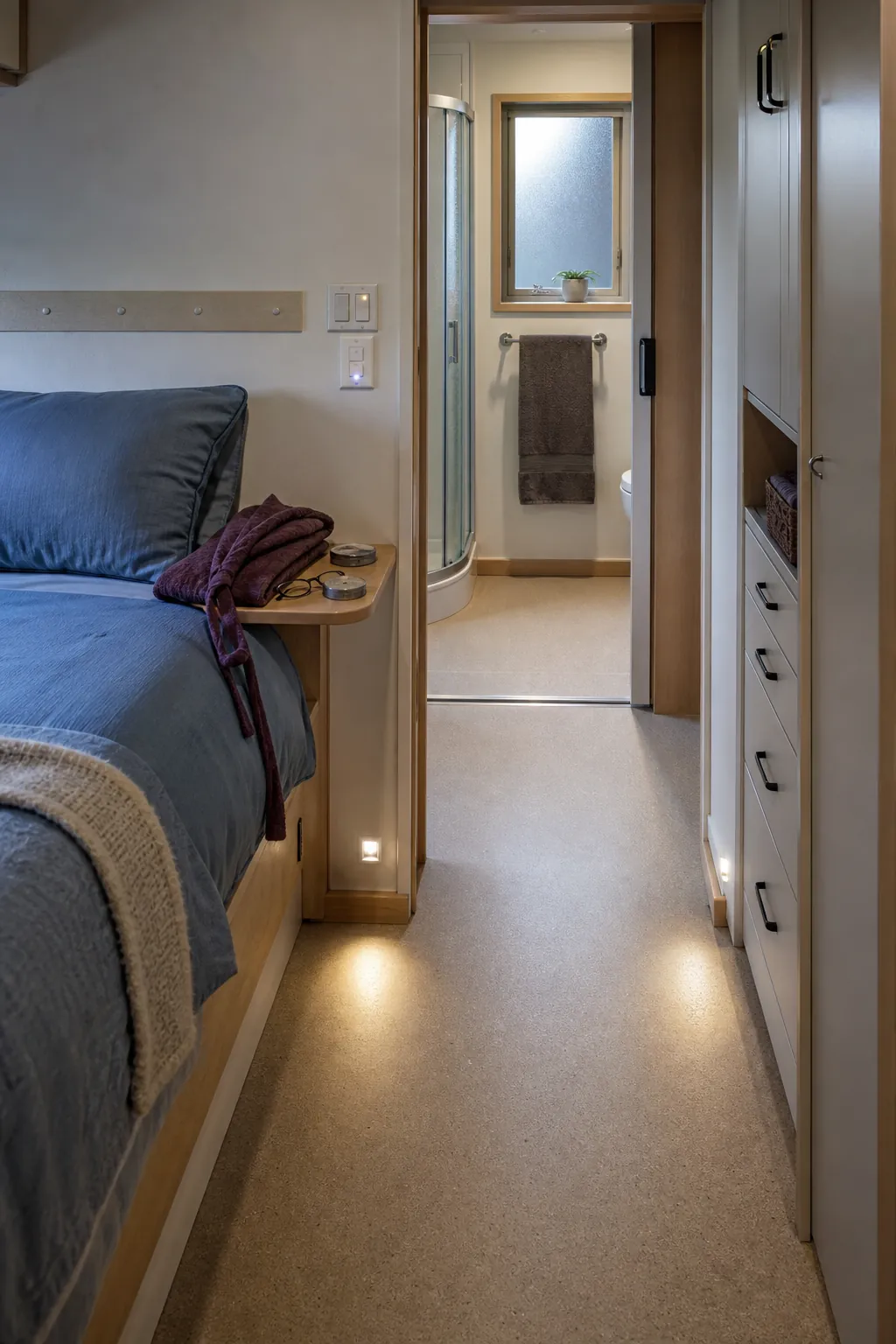 Clear step-free route from a tiny house downstairs bedroom to the bathroom