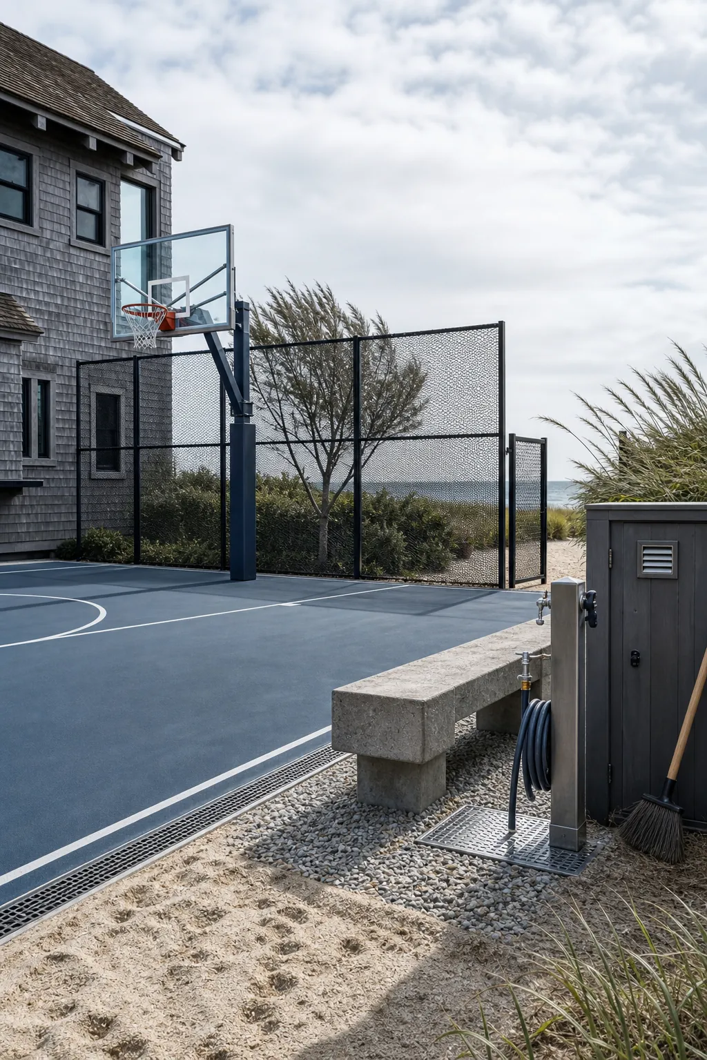 Coastal home basketball court designed for salt air and strong wind