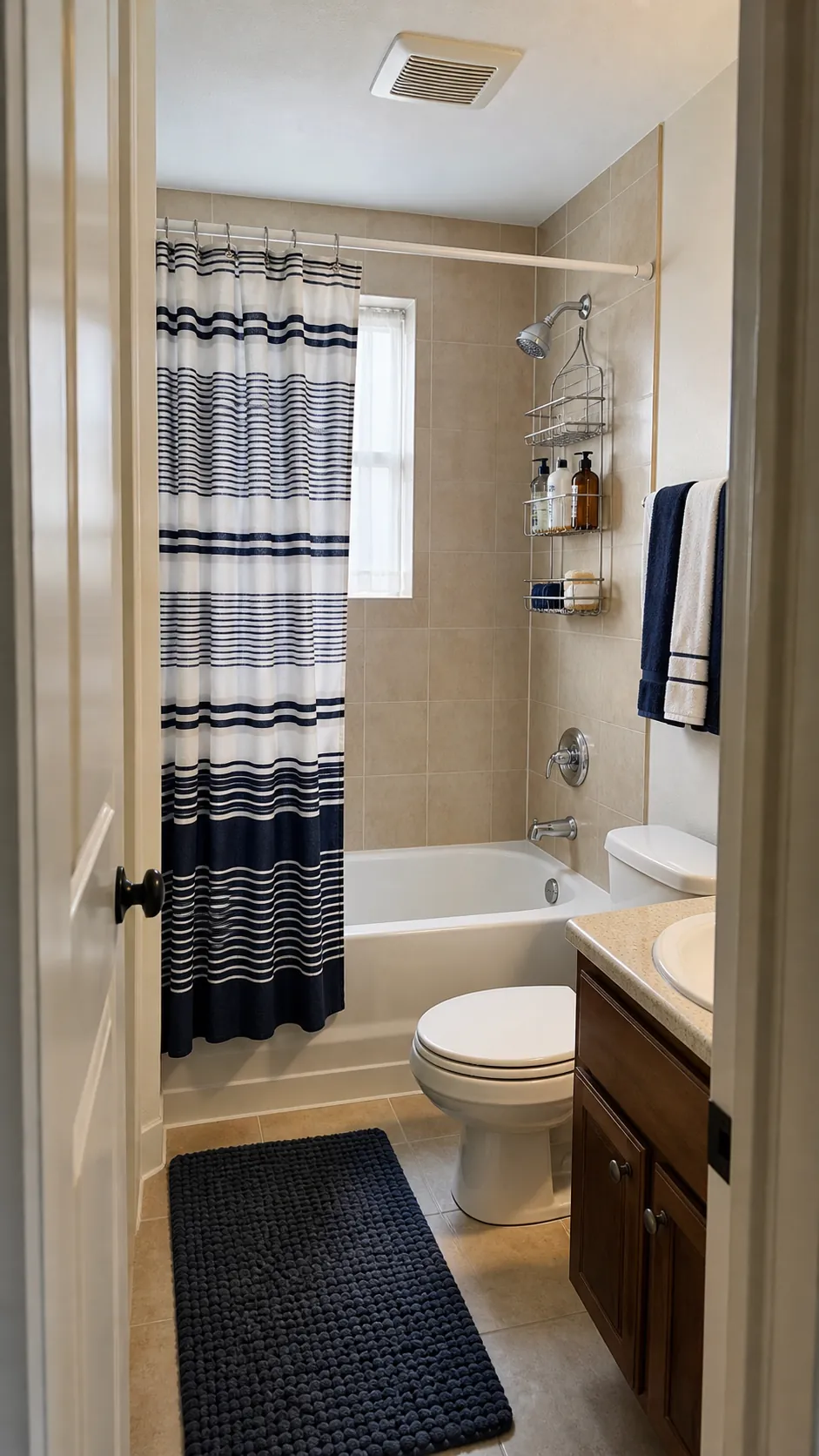 Renter-friendly small bathroom tub shower combo with organized storage