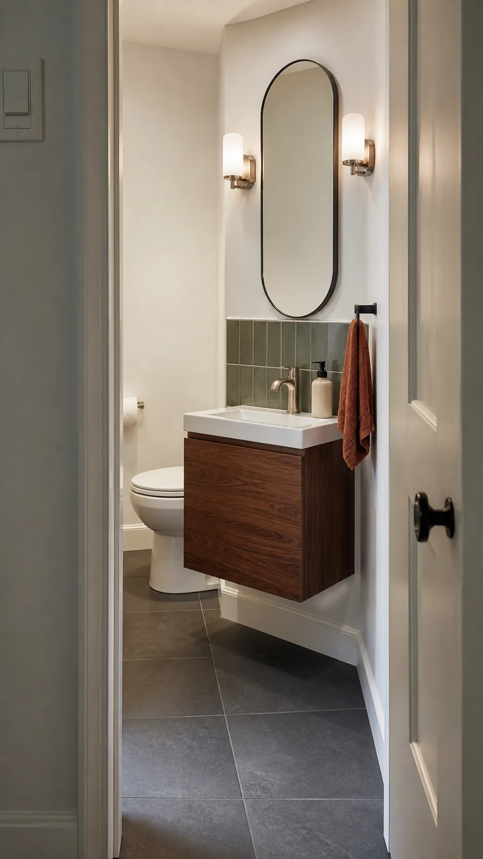 Stylish space-saving tiny half bathroom with a shallow floating vanity