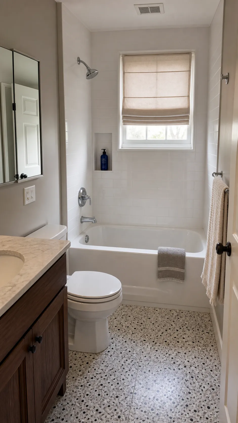 Straight-sided alcove tub preserving shower standing space