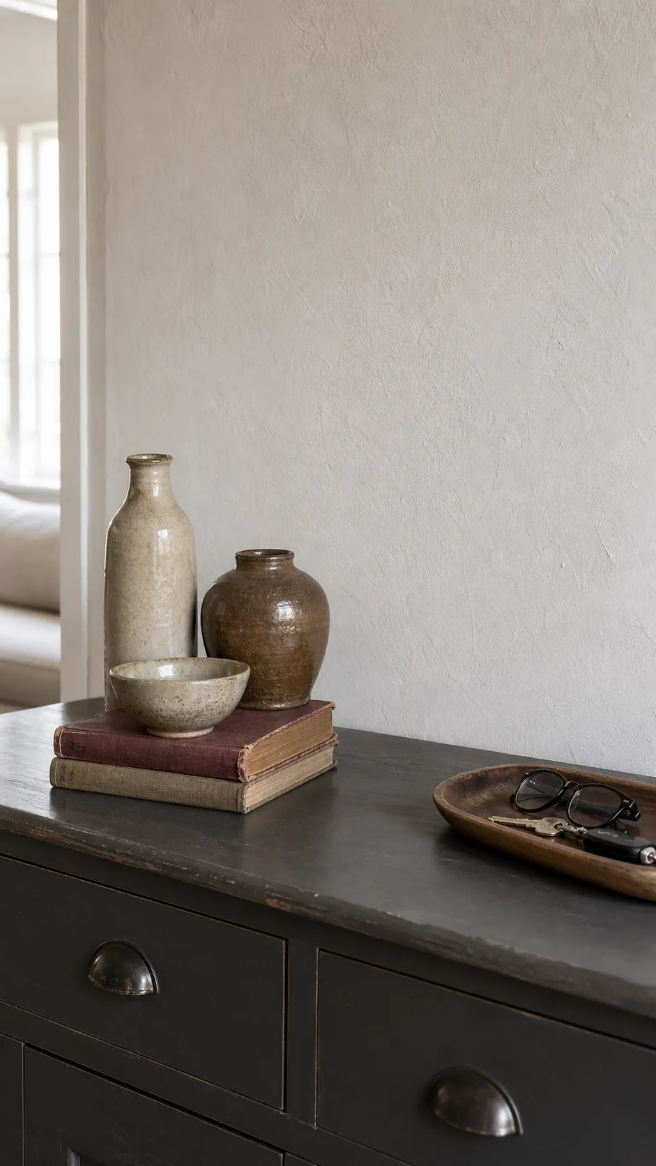Small grouping of thrifted ceramics styled with clear negative space
