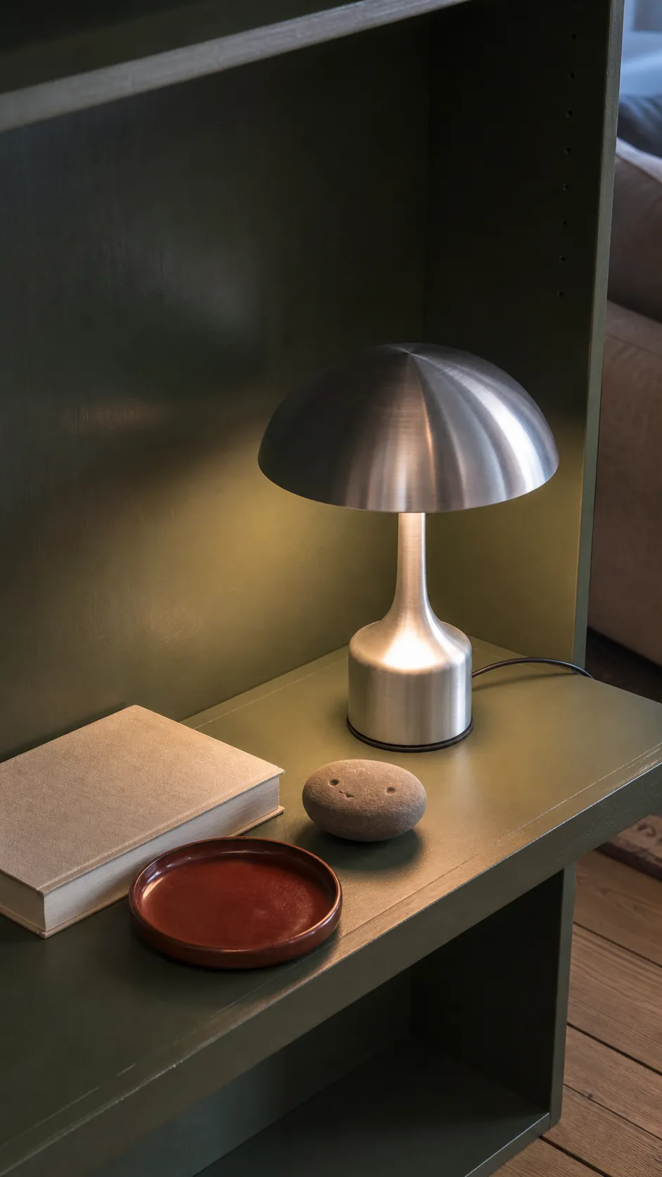Small mushroom lamp paired with low decorative objects on a shelf