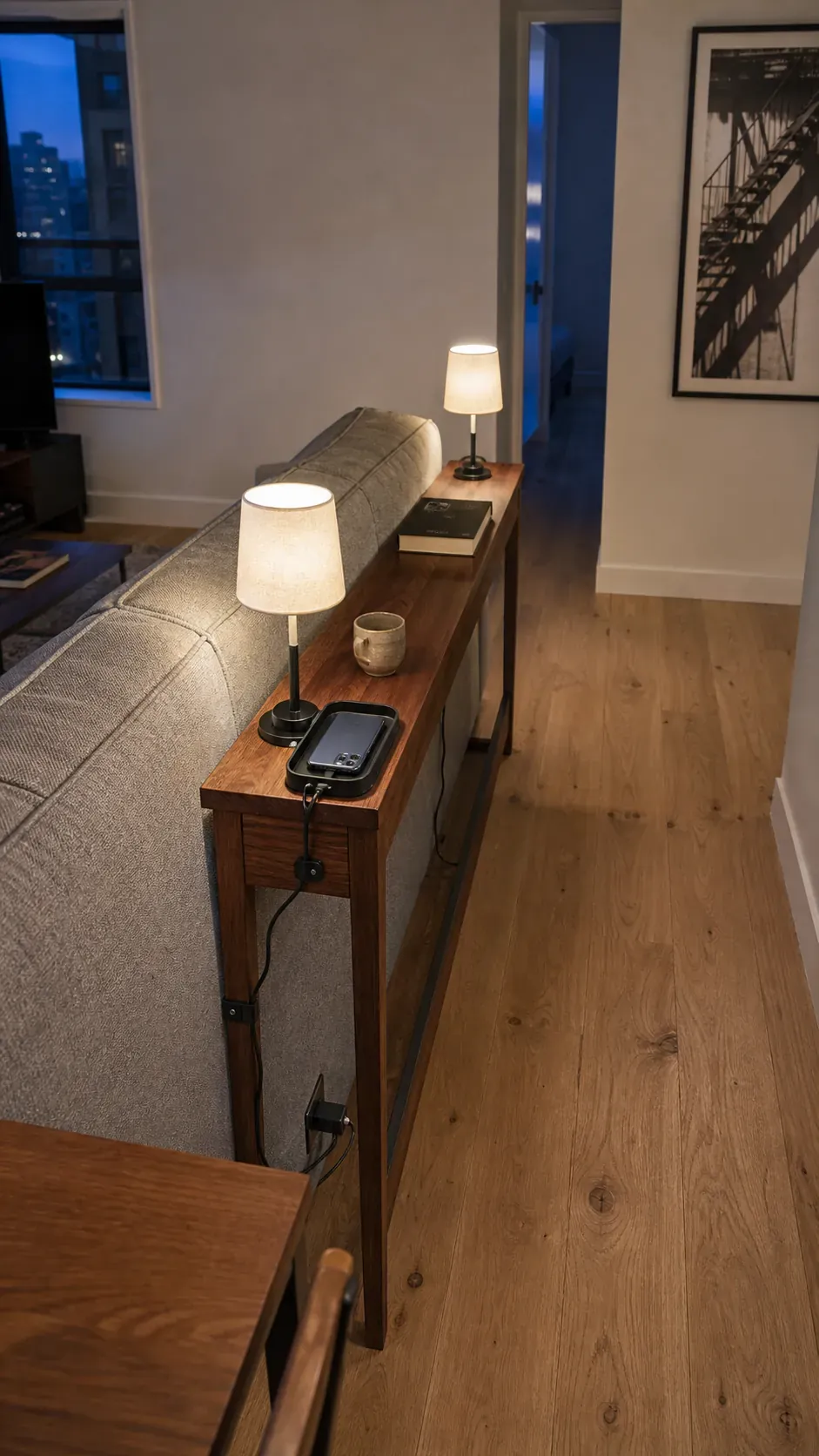 Slim console making use of space behind a floating sofa