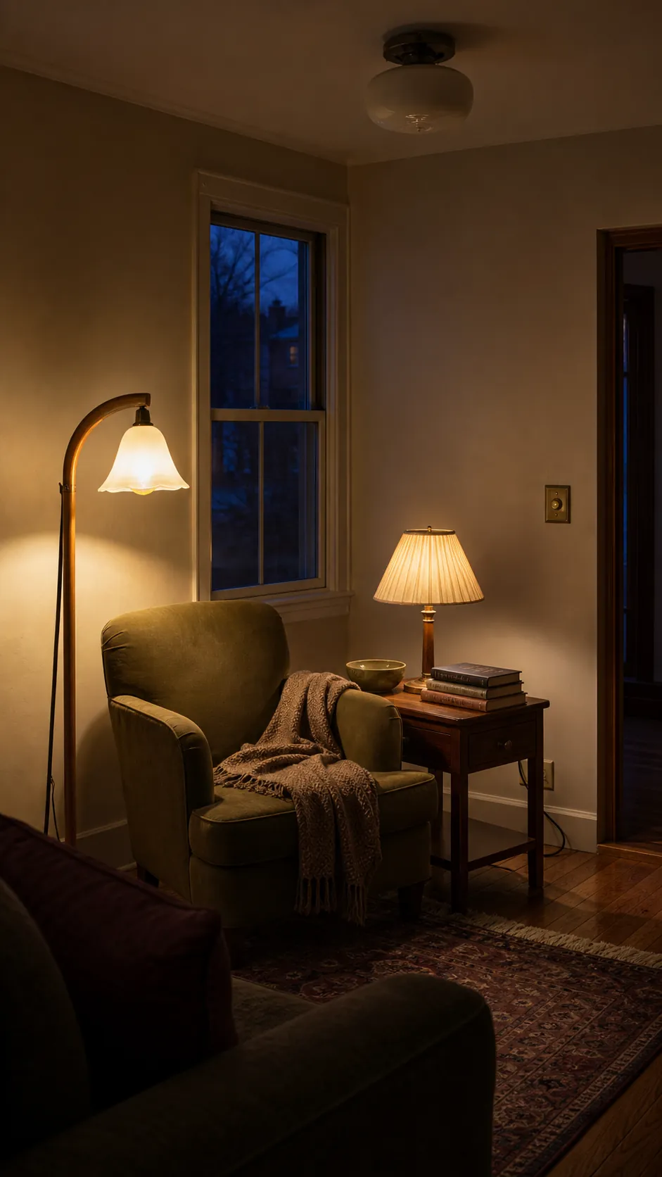 Warm living room with layered table and floor lamps revealing vintage textures