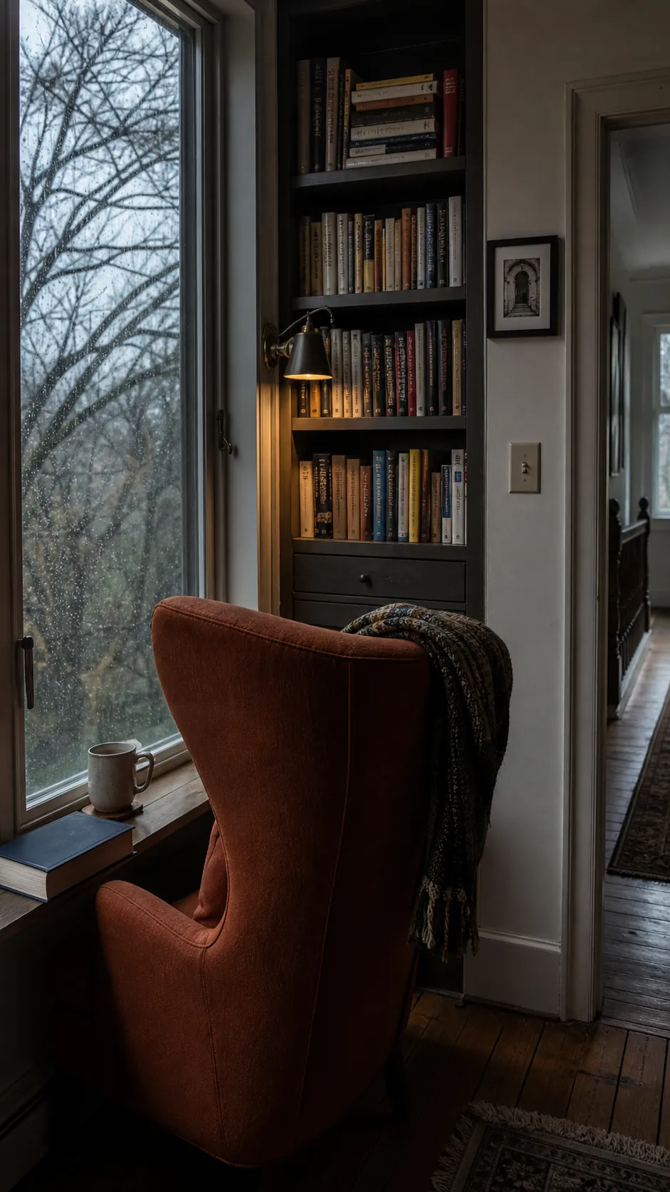 Book nook chair angled toward a peaceful window view
