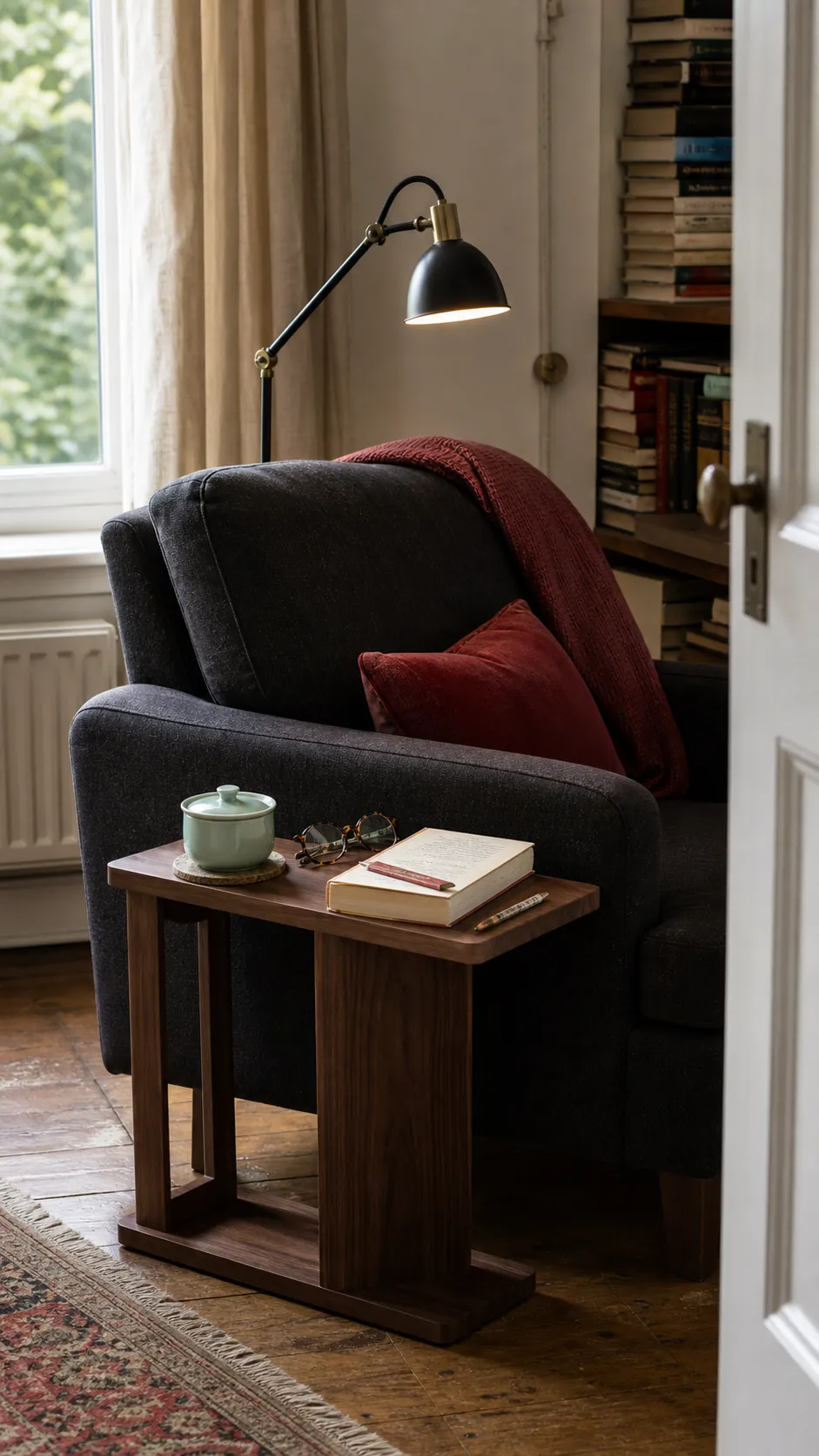 Stable side table holding tea, glasses, and a book in a reading nook