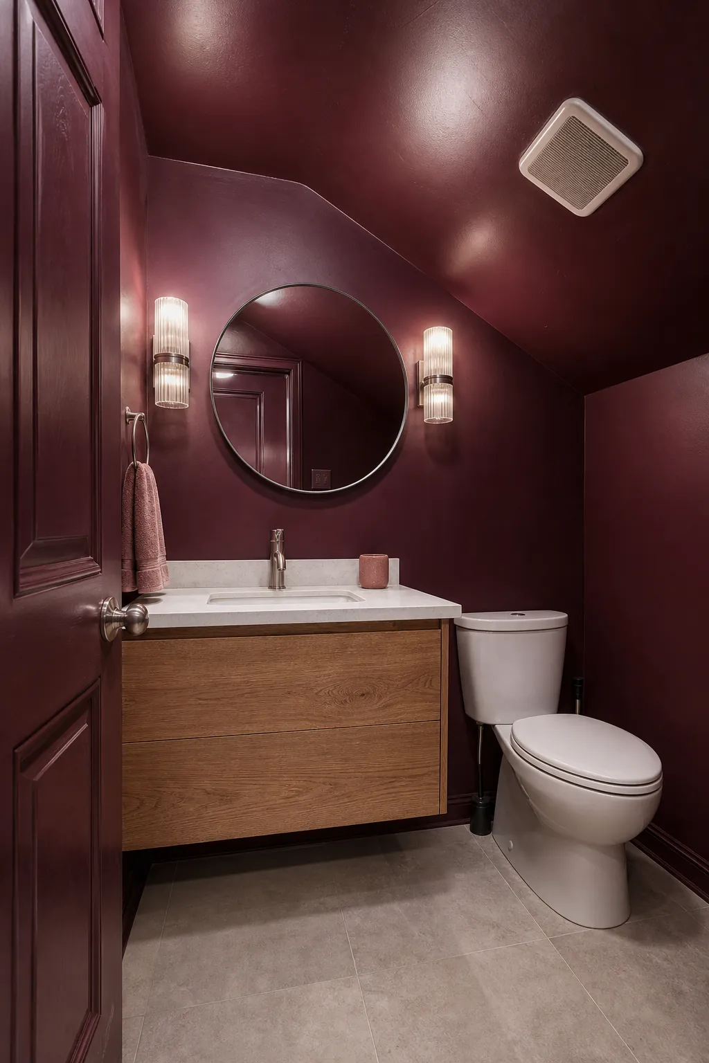 Berry color-drenched tiny half bath with matching ceiling and trim