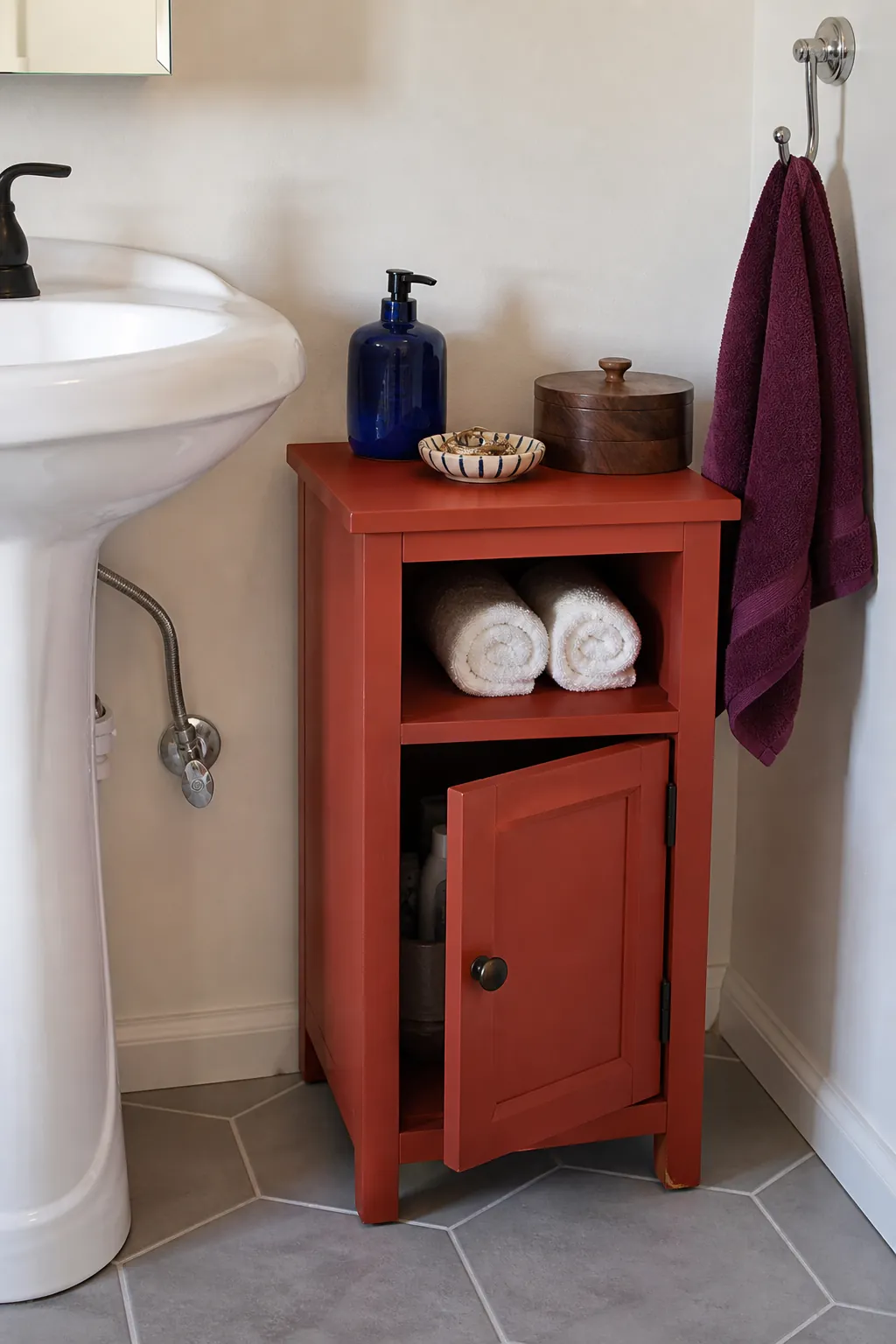 Personality-filled bathroom accessories balanced with closed practical storage