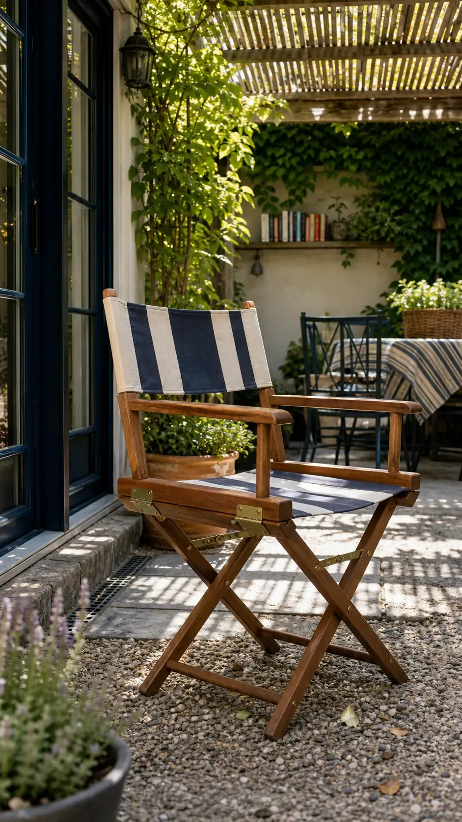 Vintage-style canvas director chair in a shaded patio reading corner