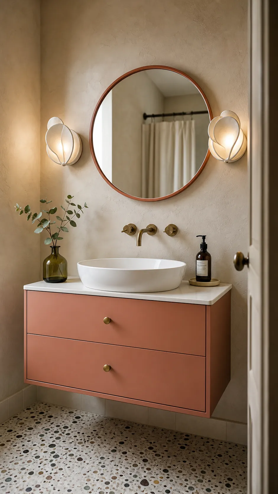 Petal Ceramic Sconces Around a Round Mirror beside a bathroom mirror