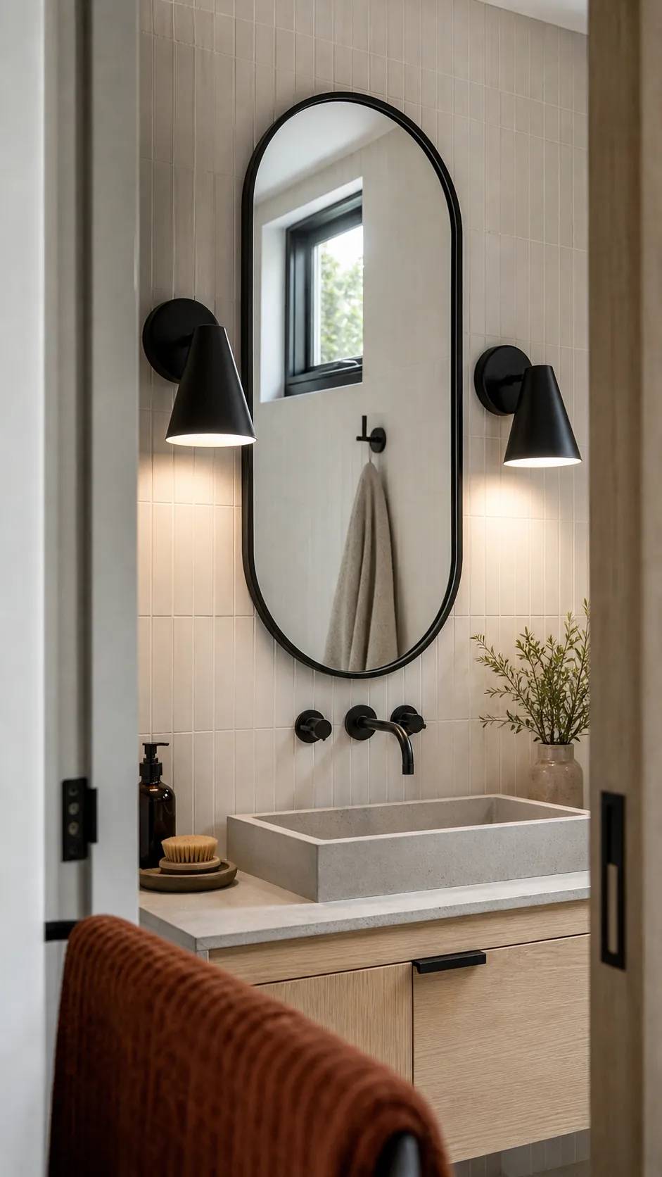 Matte Black Cones Beside a Racetrack Mirror beside a bathroom mirror
