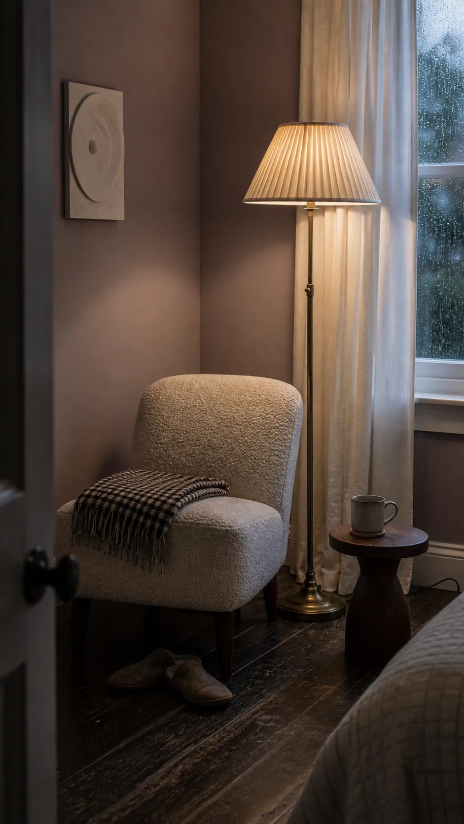 Pleated shade floor lamp warming a quiet bedroom corner