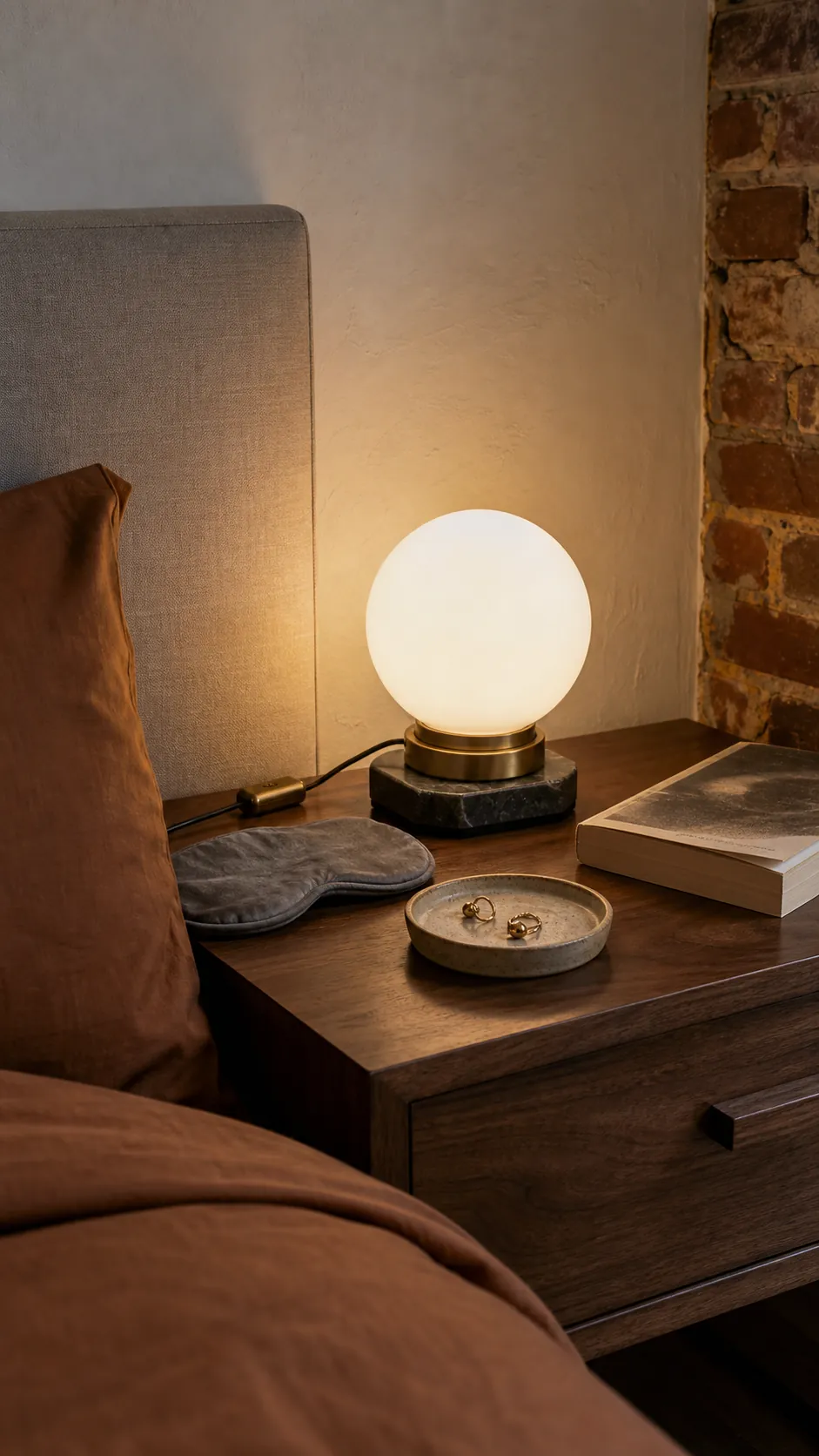 Milk-glass globe lamp producing even bedroom light