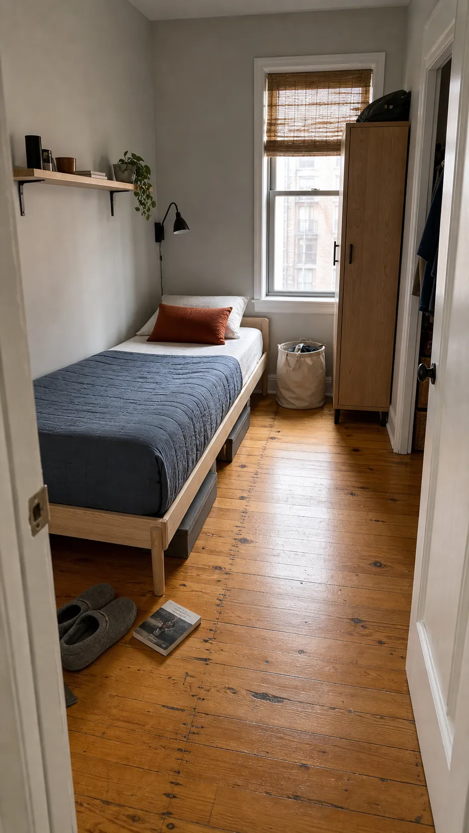 Twin bed placed along the longest wall in a small bedroom