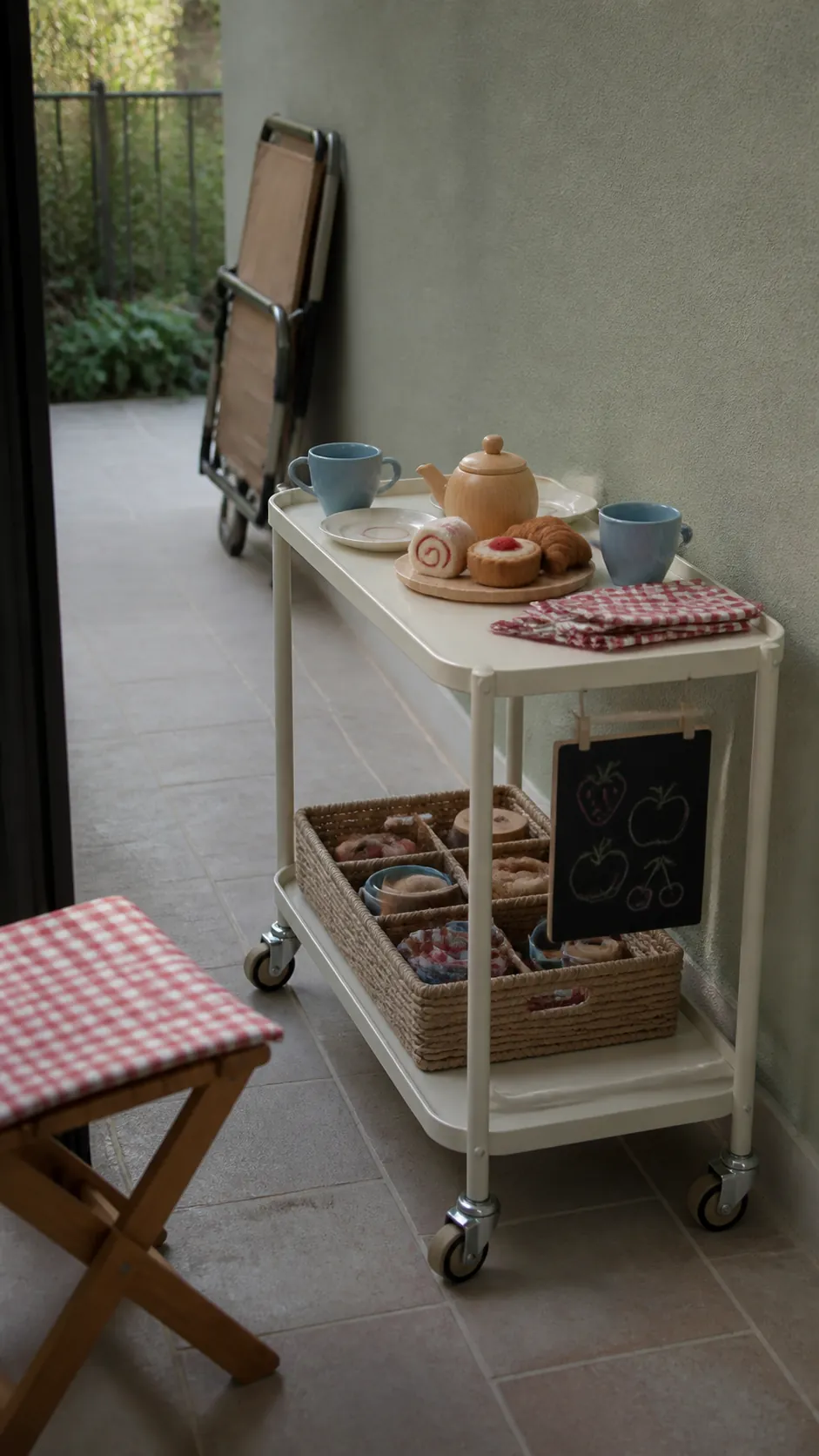 Mobile pretend café cart used for children's patio play