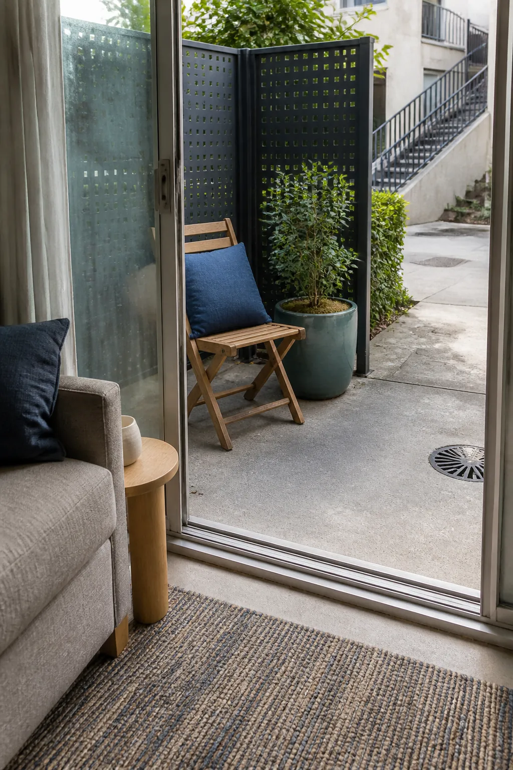 Apartment patio colors coordinated with the adjacent living room