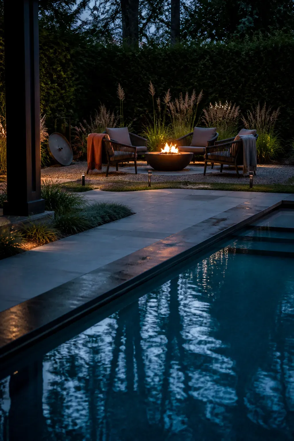 Poolside fire lounge positioned safely beyond the wet circulation path