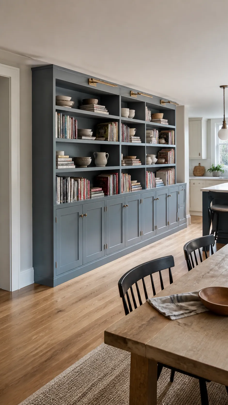 Library-Style Bookcase styled as large kitchen wall decor in a realistic home