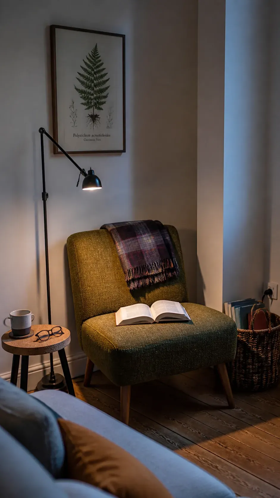 Compact reading nook with an armless chair and floor lamp