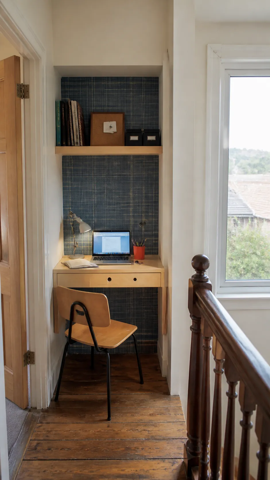 Compact built-in workstation fitted into a small house alcove