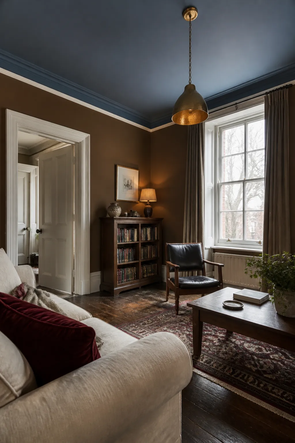 Smoky blue ceiling above warm brown living room walls