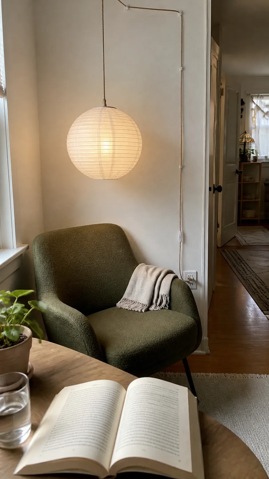 Hang a Plug-In Pendant Over a Reading Chair in a compact small home