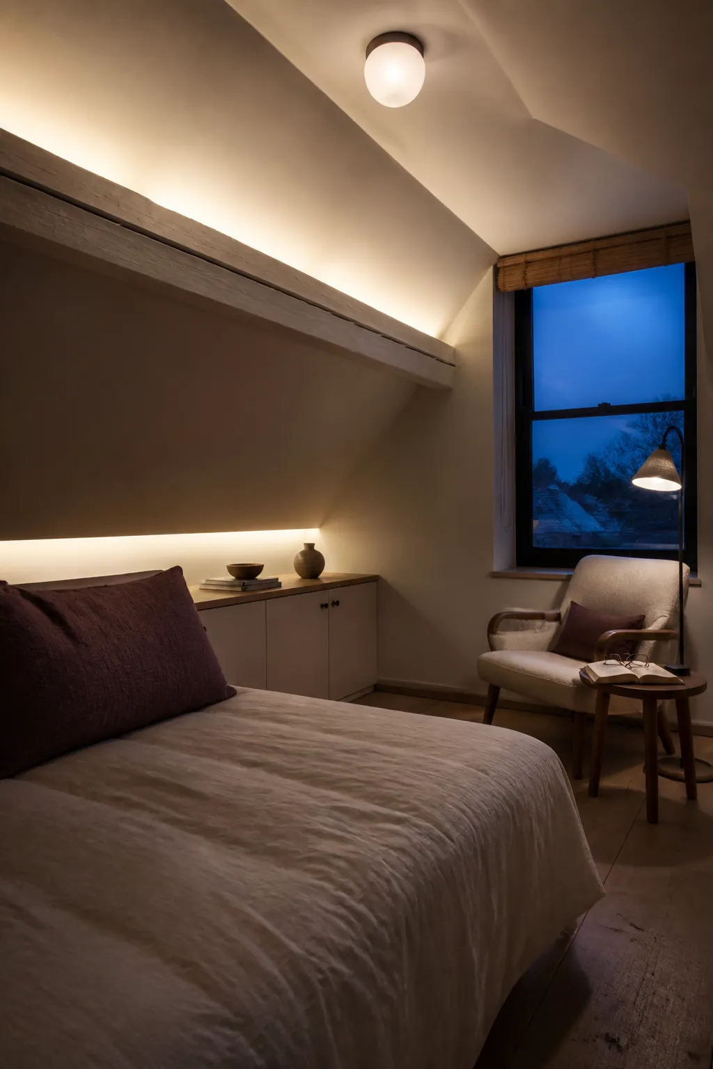 Indirect lighting softly washing a sloped attic ceiling