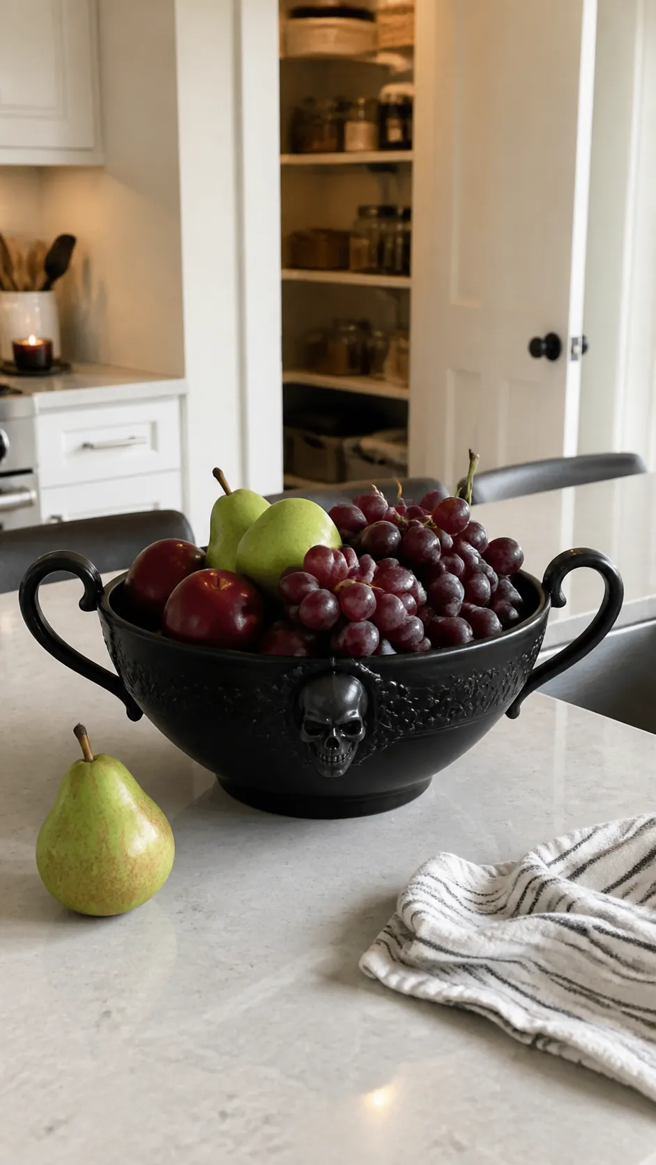 Matte black cauldron bowl filled with kitchen fruit