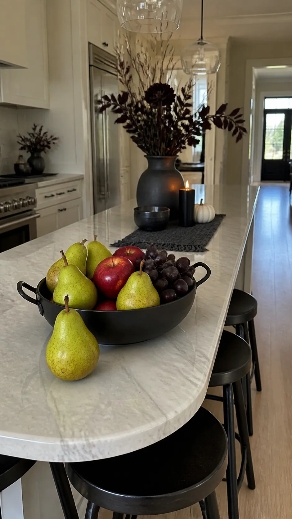 Low cauldron fruit bowl on a Halloween kitchen island