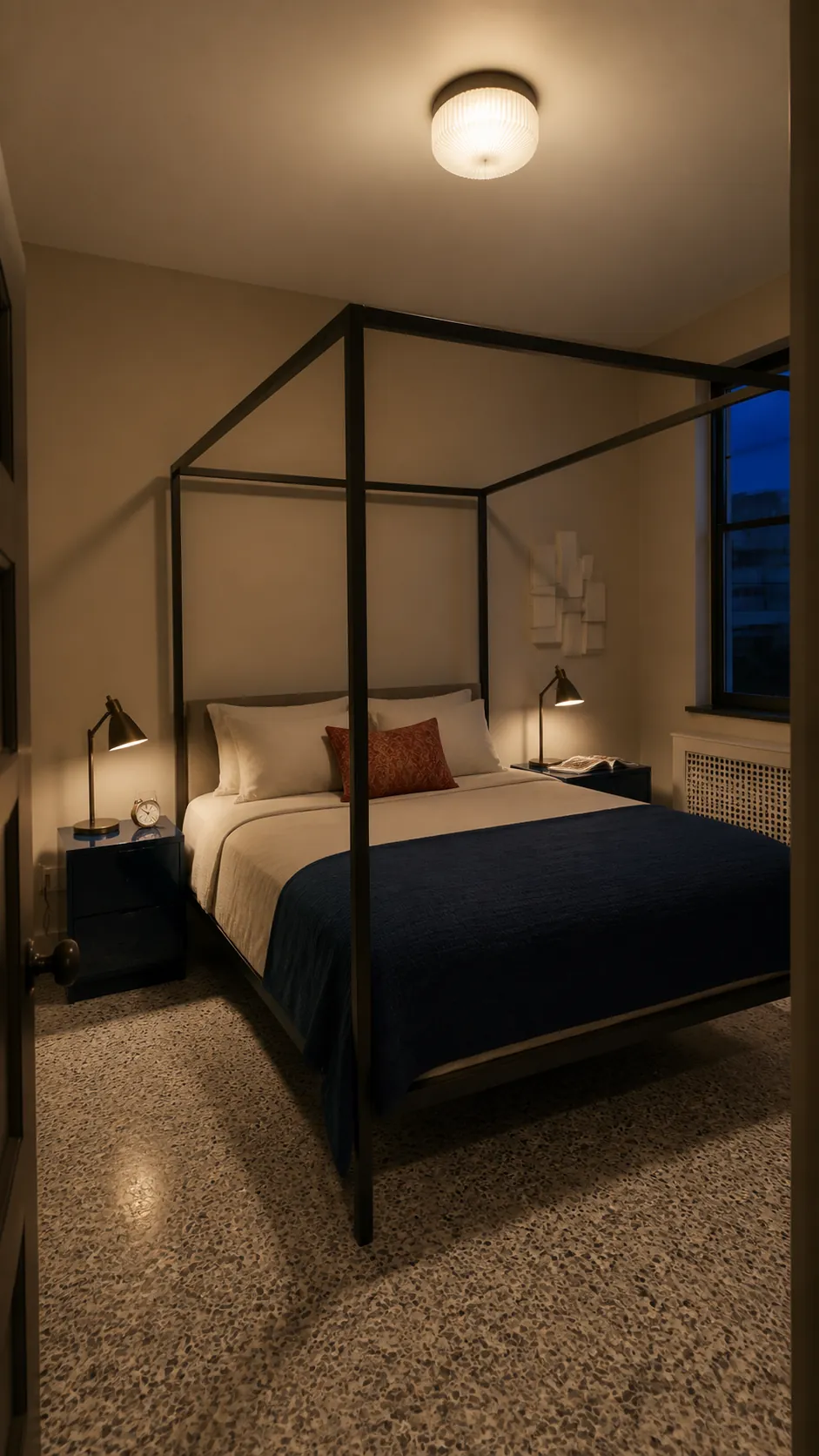 Soft flush mount and bedside lighting around a metal canopy bed