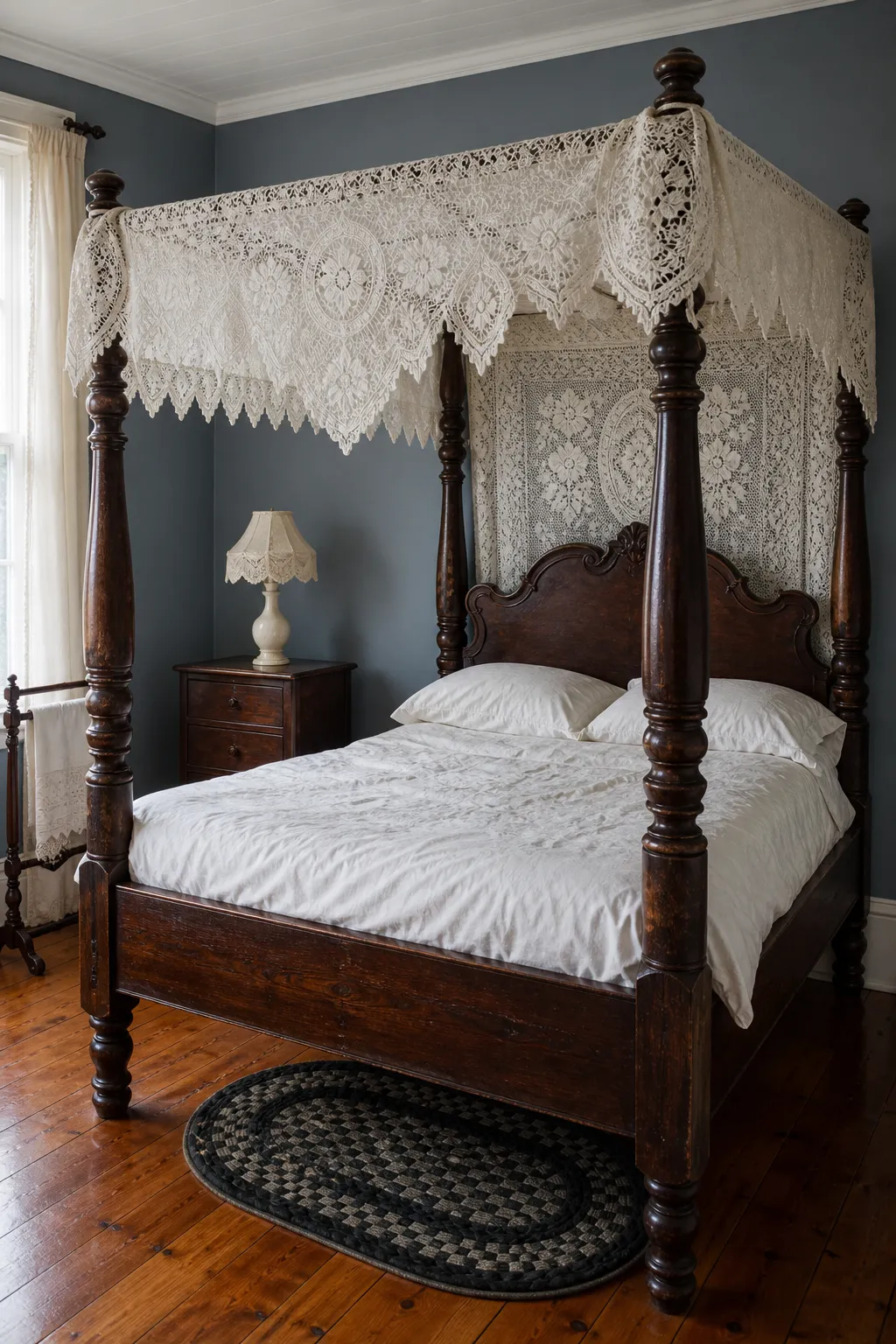 Antique wood four-poster bed dressed with delicate lace curtains