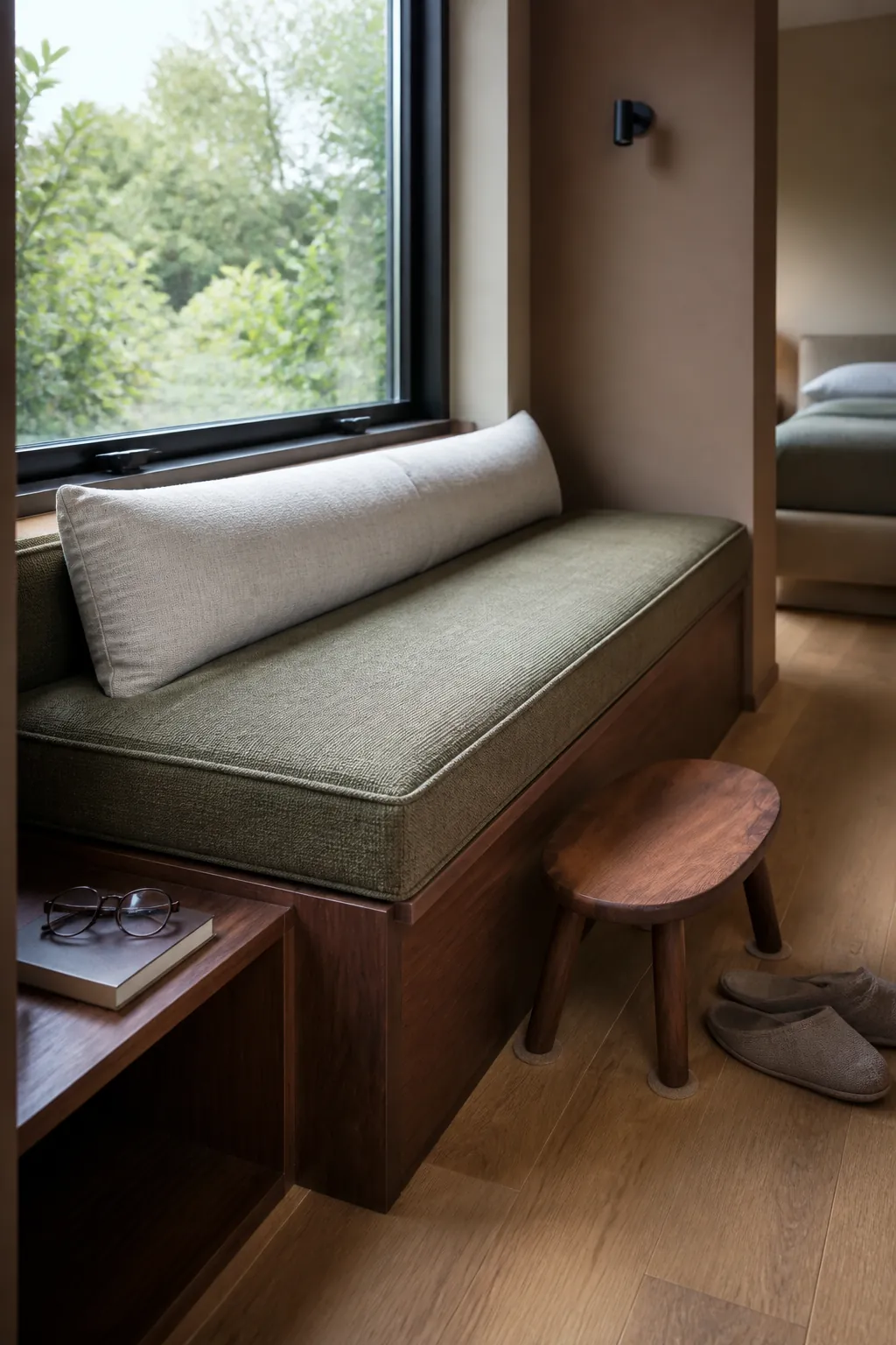 Comfortable bedroom window bench with supportive base and long lumbar cushion