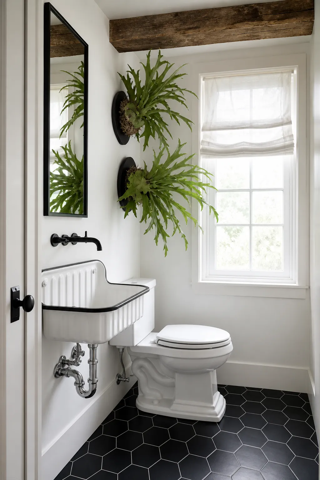 Vintage bathroom featuring a black-and-white wall-mounted sink and classic fixtures