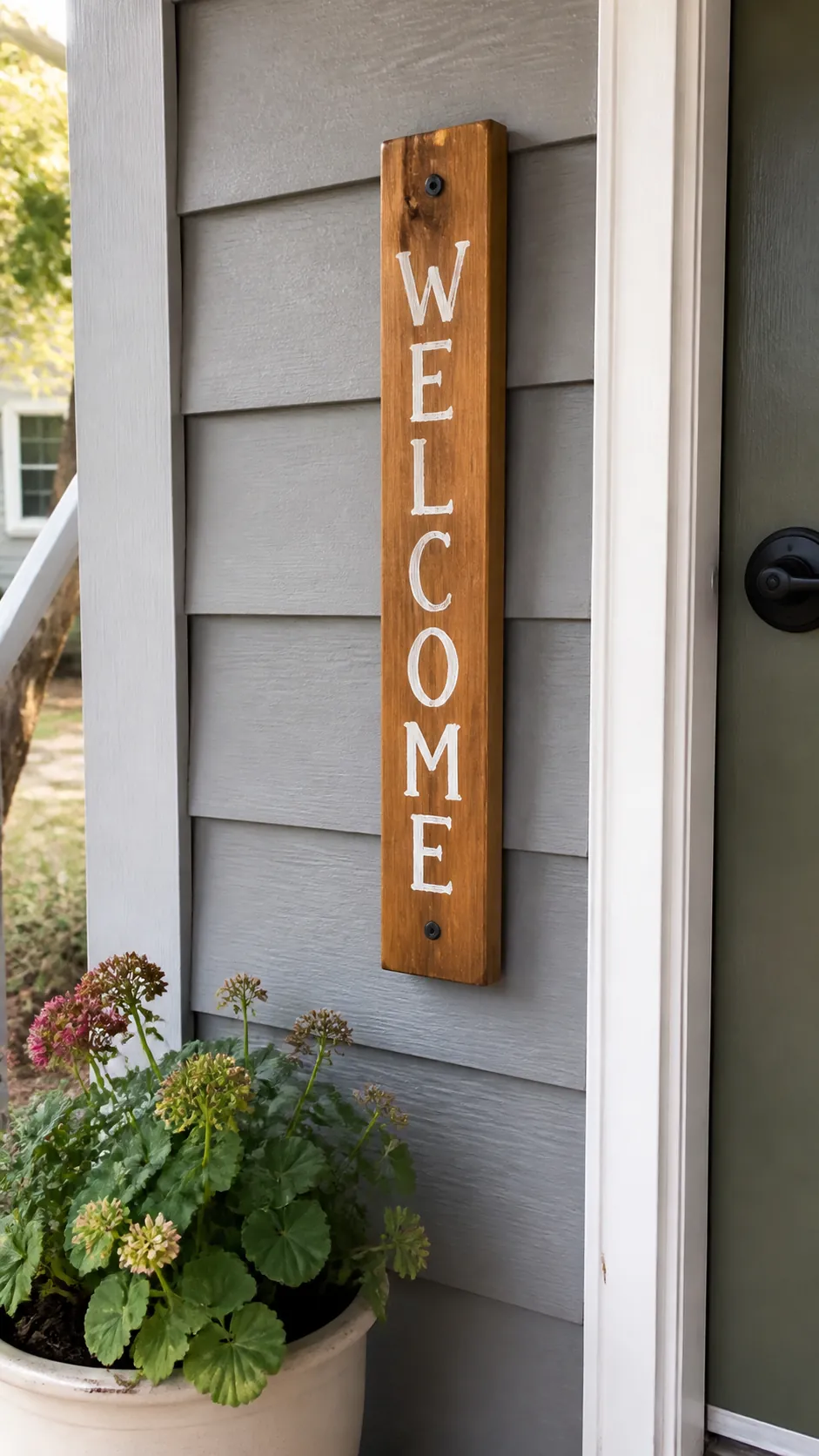 Scrap wood painted as a simple fall porch welcome sign