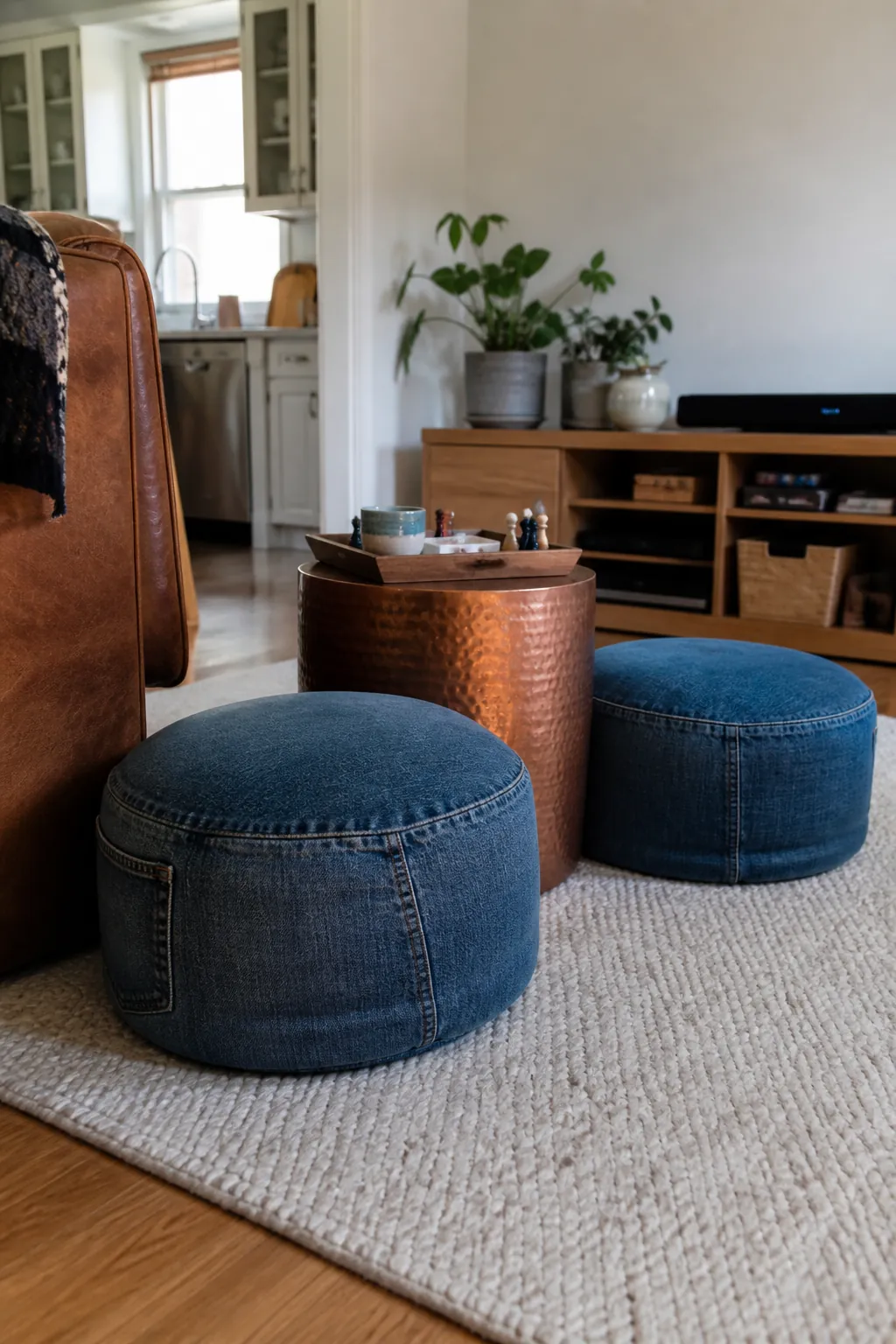 Denim Poufs Around A Copper Table styled for a blue and orange fall living room