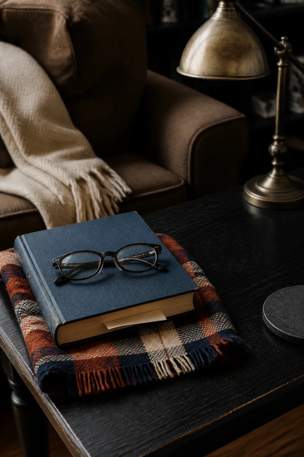 Plaid wrapped book with reading glasses for useful fall coffee table decor