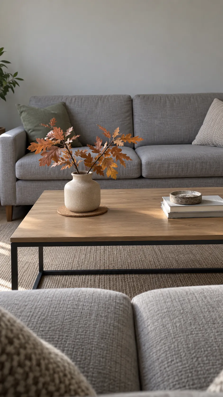 Short autumn branches below the sofa sightline