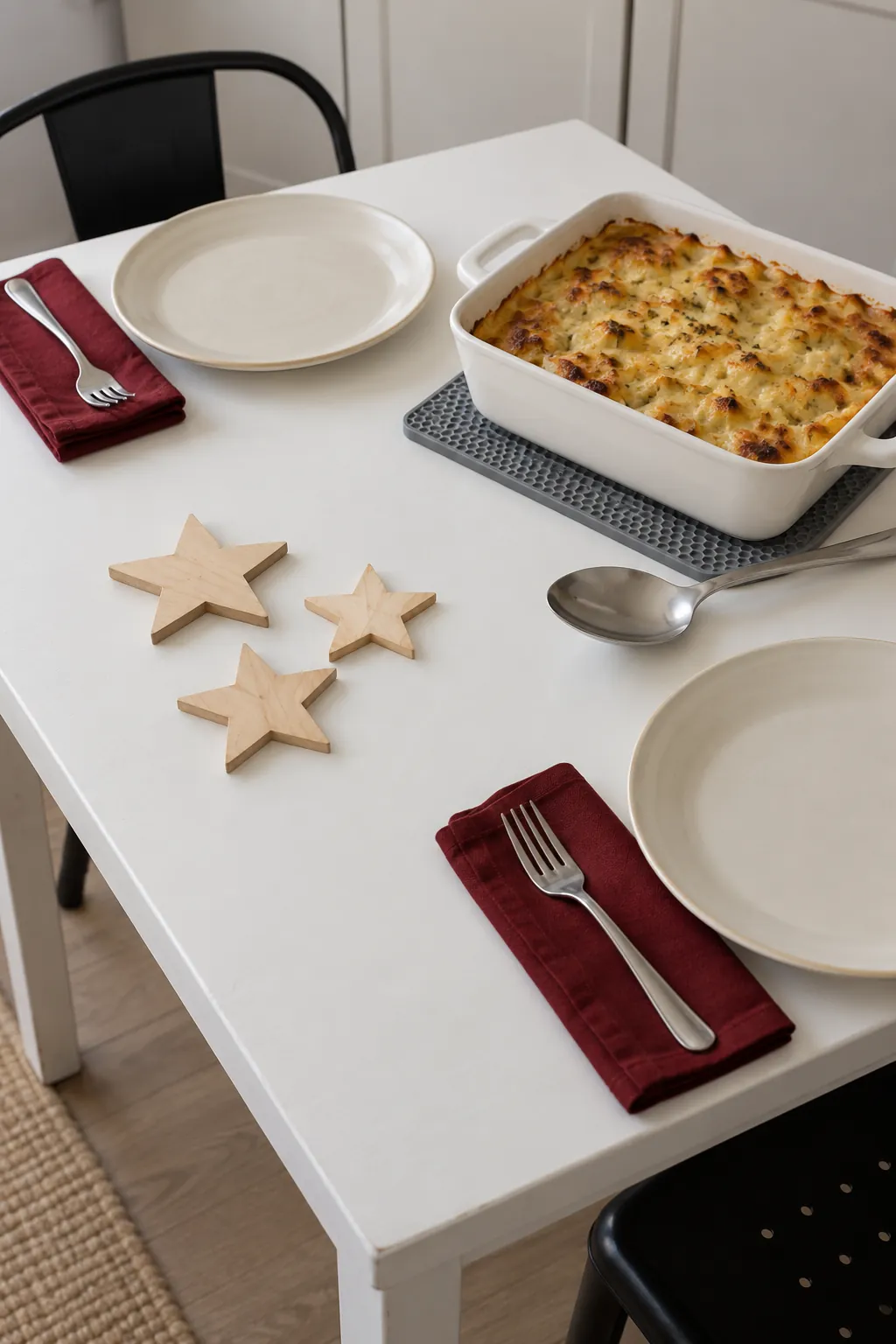 Flat wooden stars grouped narrowly beside a serving dish and trivet