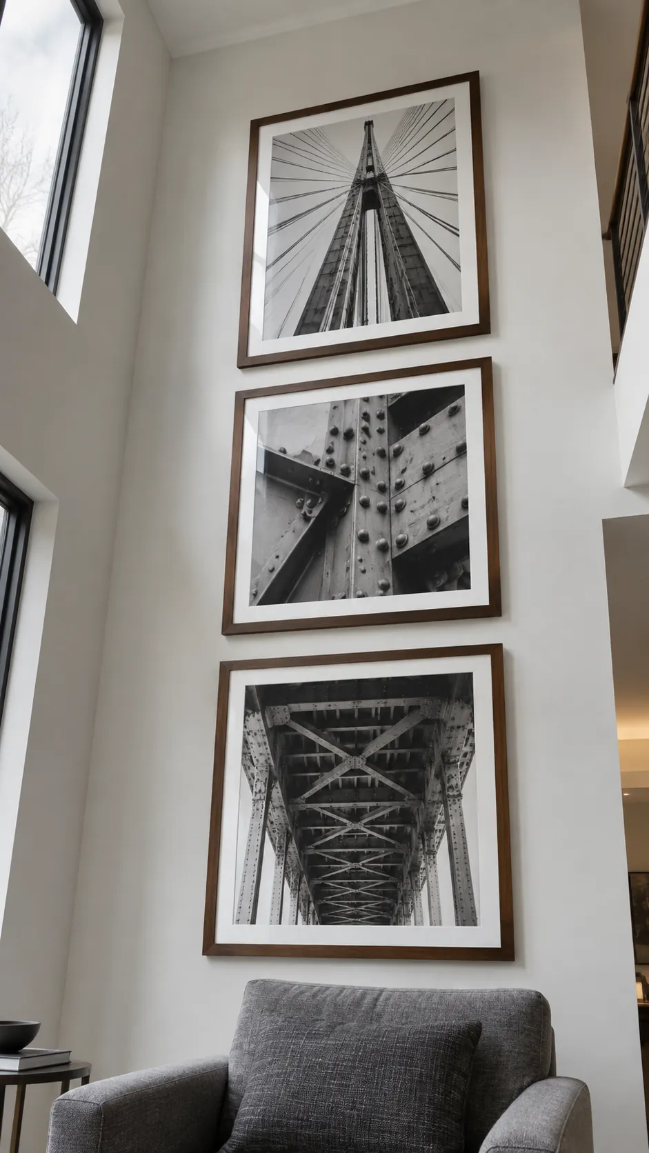 A tall column for a high ceiling living room gallery wall