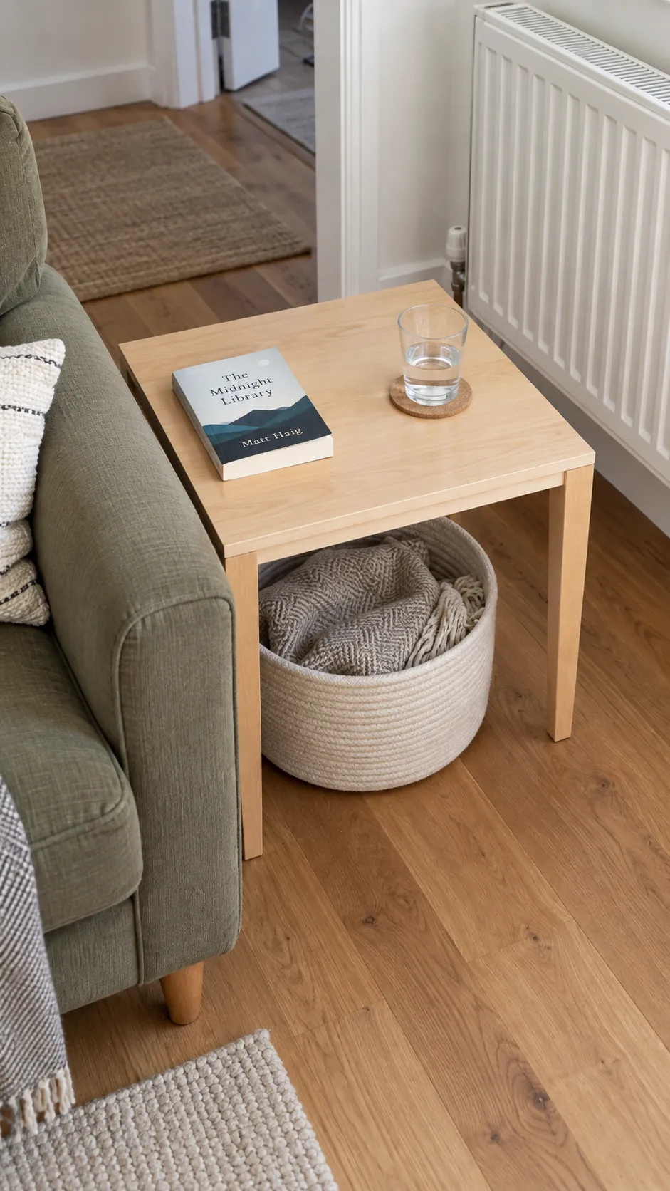 A useful side table with a clear surface and one current book