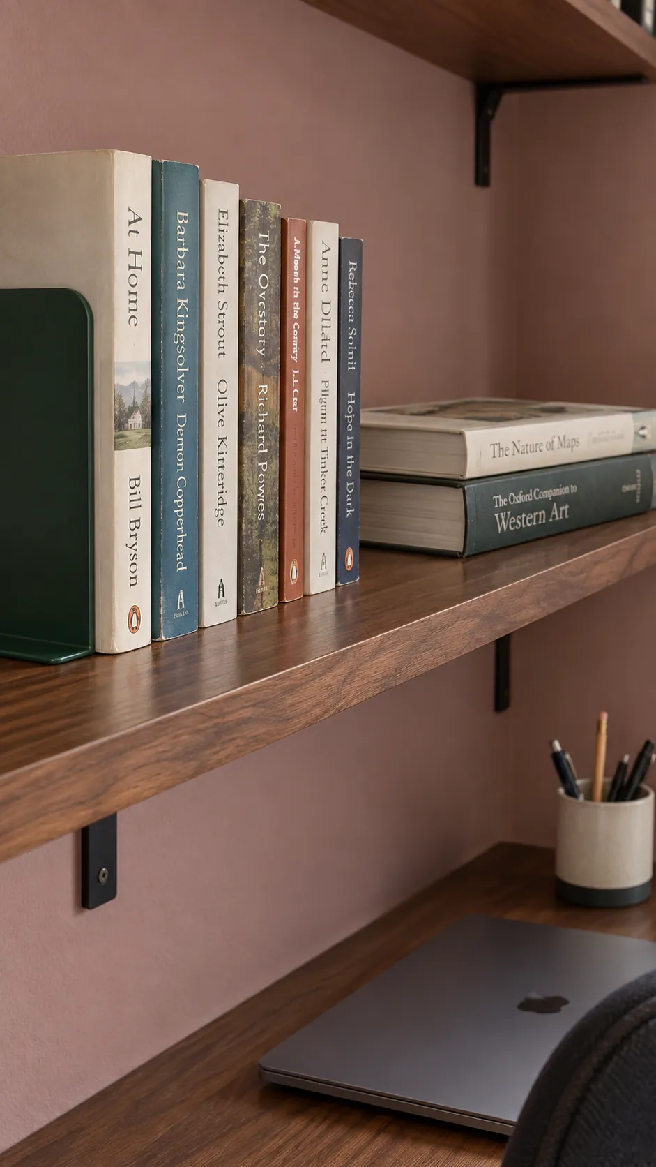 Readable books grouped on a compact study shelf