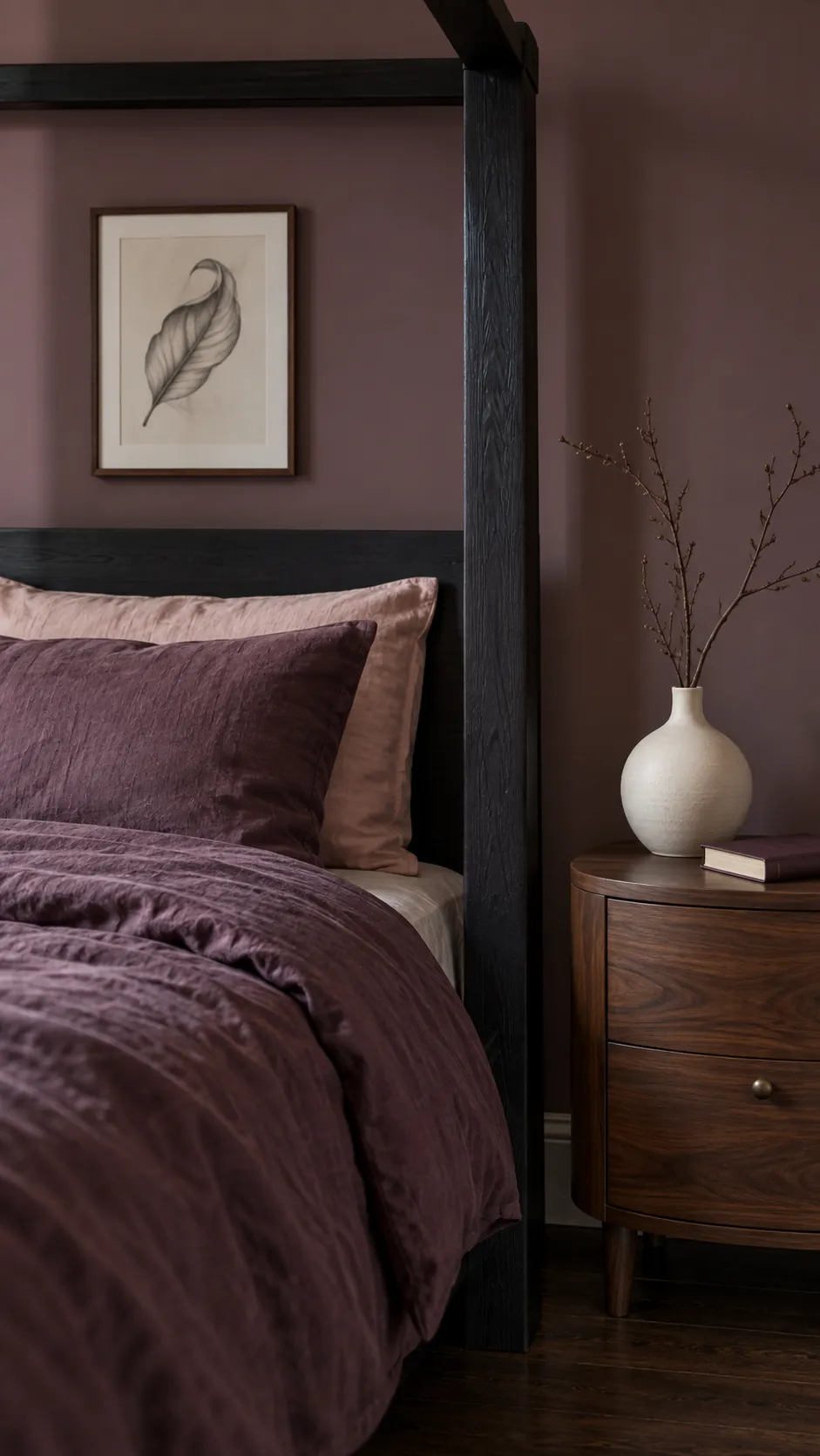 Plum linen and walnut furniture beside a black wood canopy frame