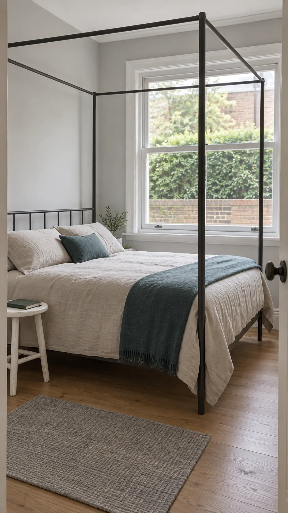 Open canopy frame preserving a small bedroom window view